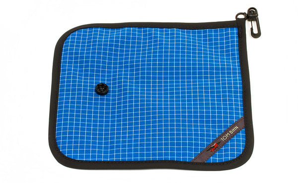 The back of a Tool Pen Wrap in Island (blue with white grid) 200 Halcyon.